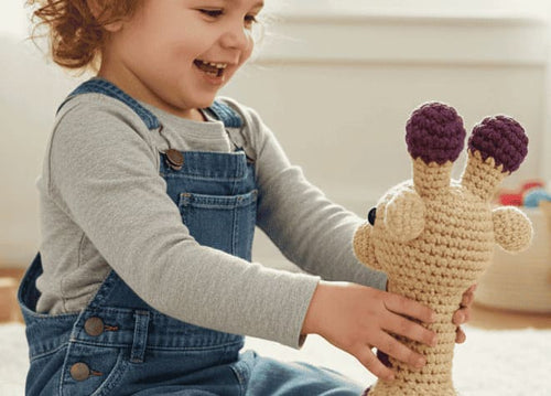Child playing with a crochet toy in a home setting
