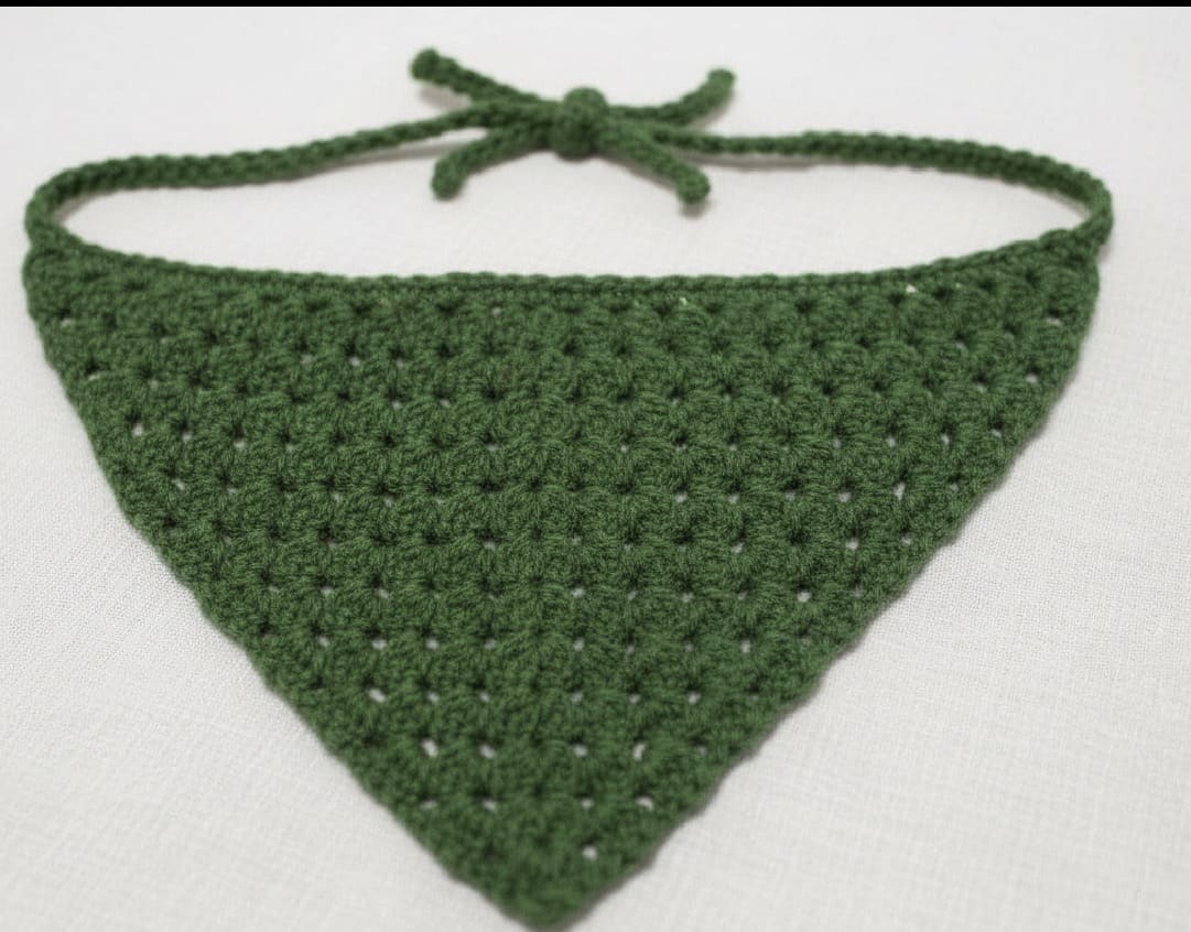 Green crochet bandana on a white background